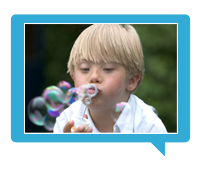 Boy blowing bubbles